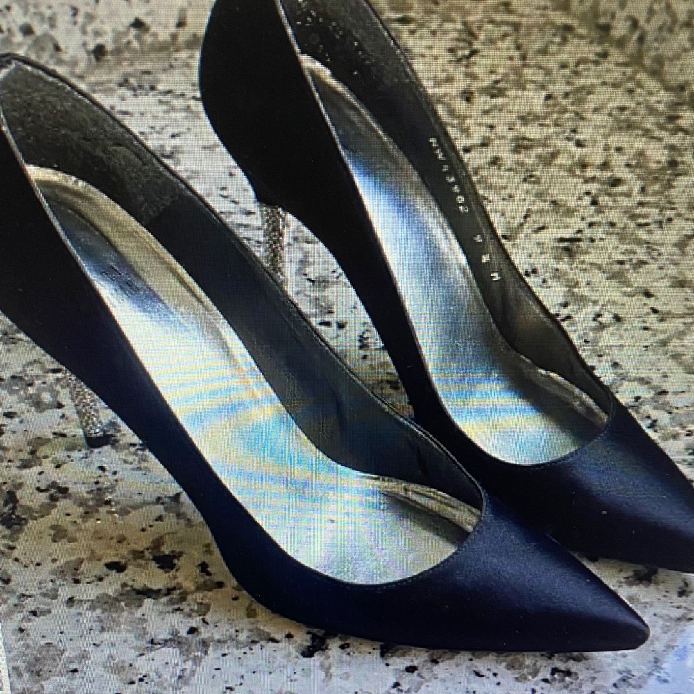 Chic Black Heels with Glittering Silver Details